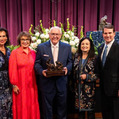 President Blair Blackburn and First Lady Michelle Blackburn stand with Dr. David Dykes and Cindy Dykes following Dr. Dykes being presented with the Servant Leadership Award